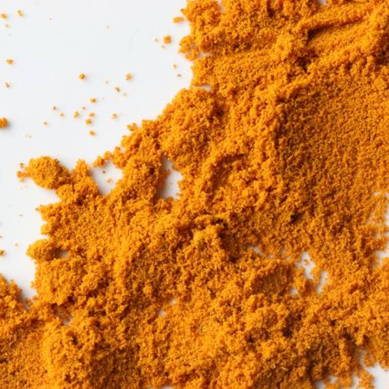 Powdered tumeric, the spice that contains curcumin. 