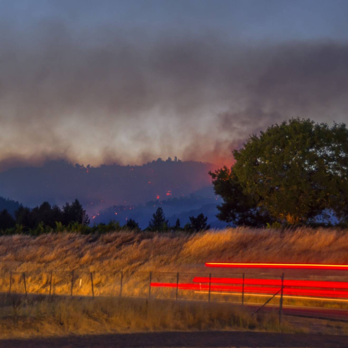 Wildfire burns at dusk