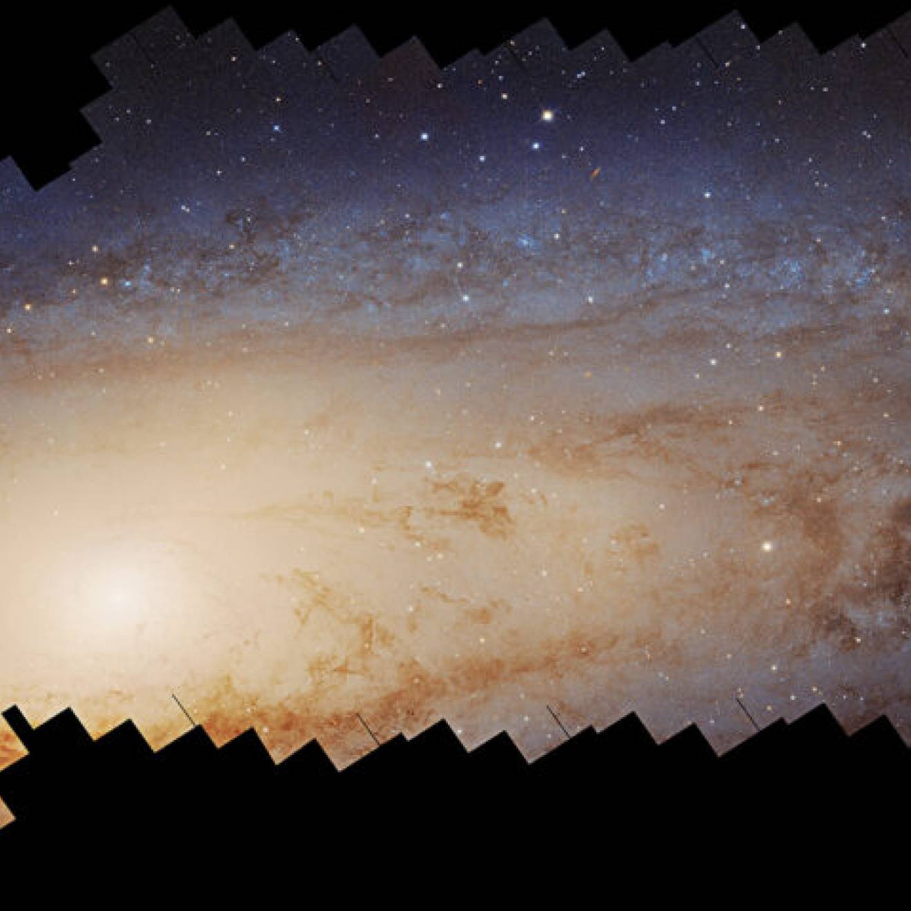 Glowing, swirling stars in a panorama: A photomosaic panorama of the Andromeda galaxy assembled over 10 years by the Hubble Space Telescope