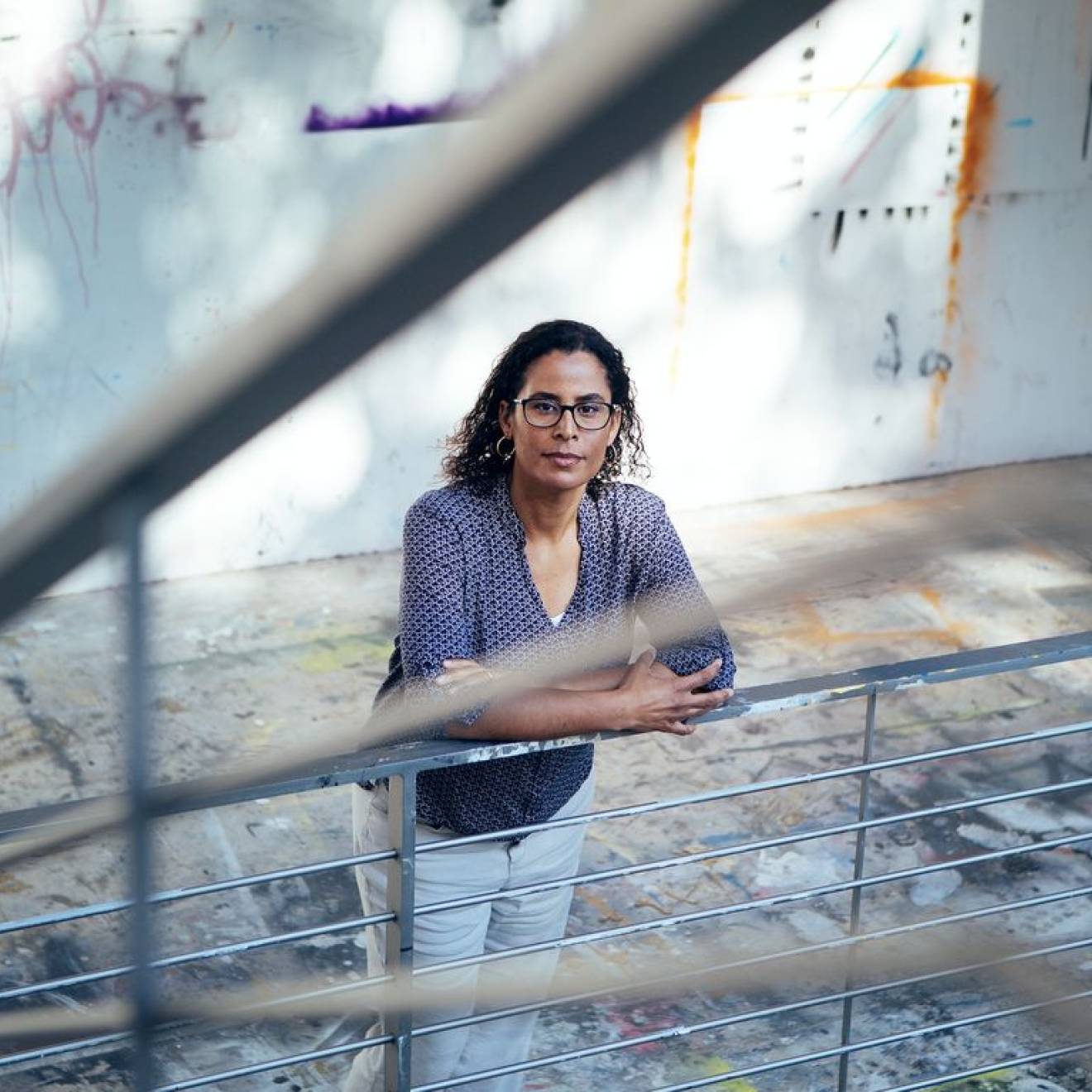 Woman with glasses photographed from above