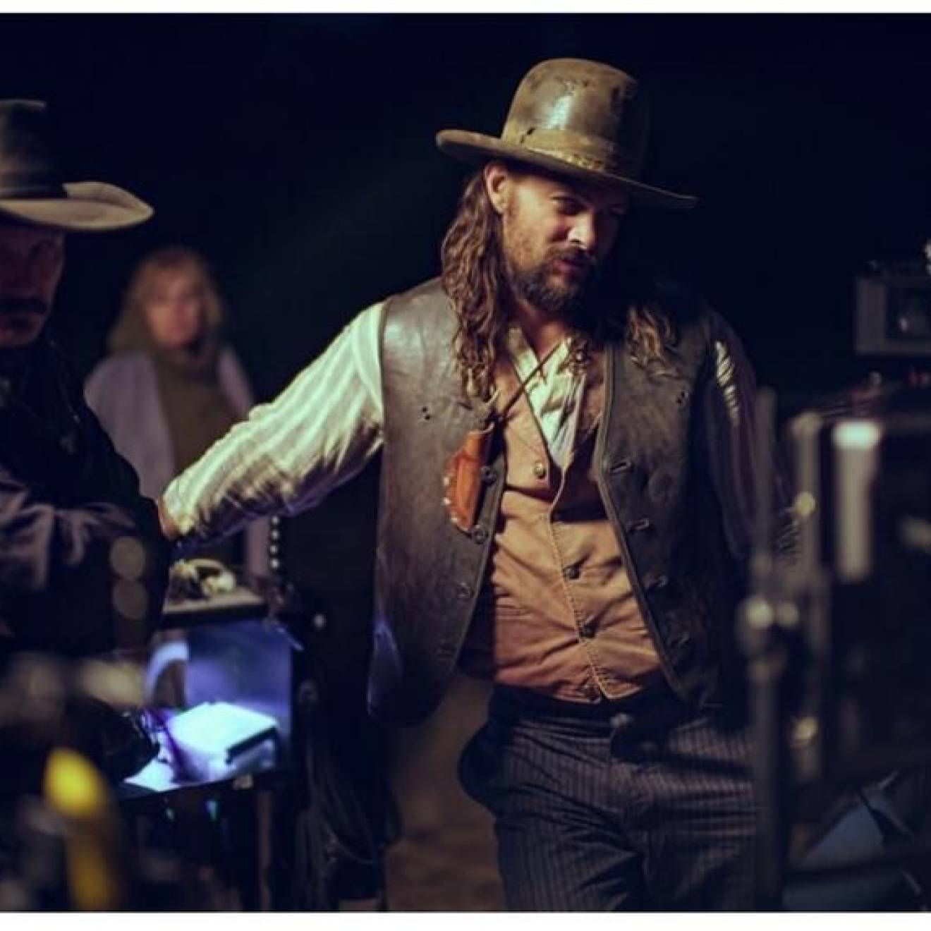 Bearded Jason Momoa in Western clothes on the set of his new movie The Last Manhunt