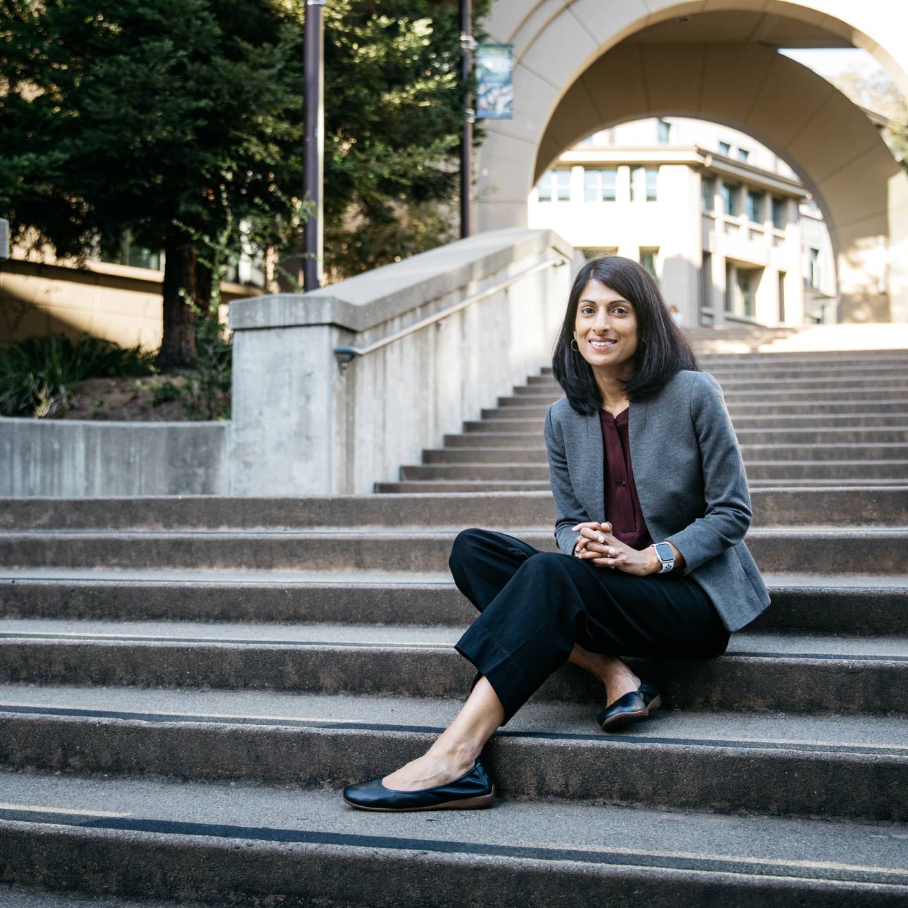 2025 MacArthur fellows A professor sits on stairs on the UC Berkeley campus