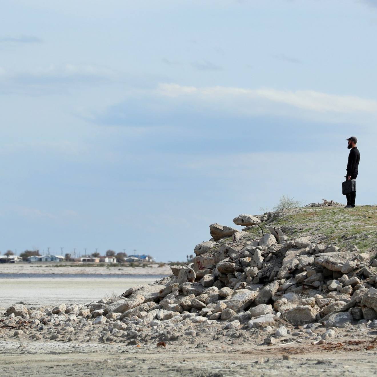 A man looks over the dry Salton Sea