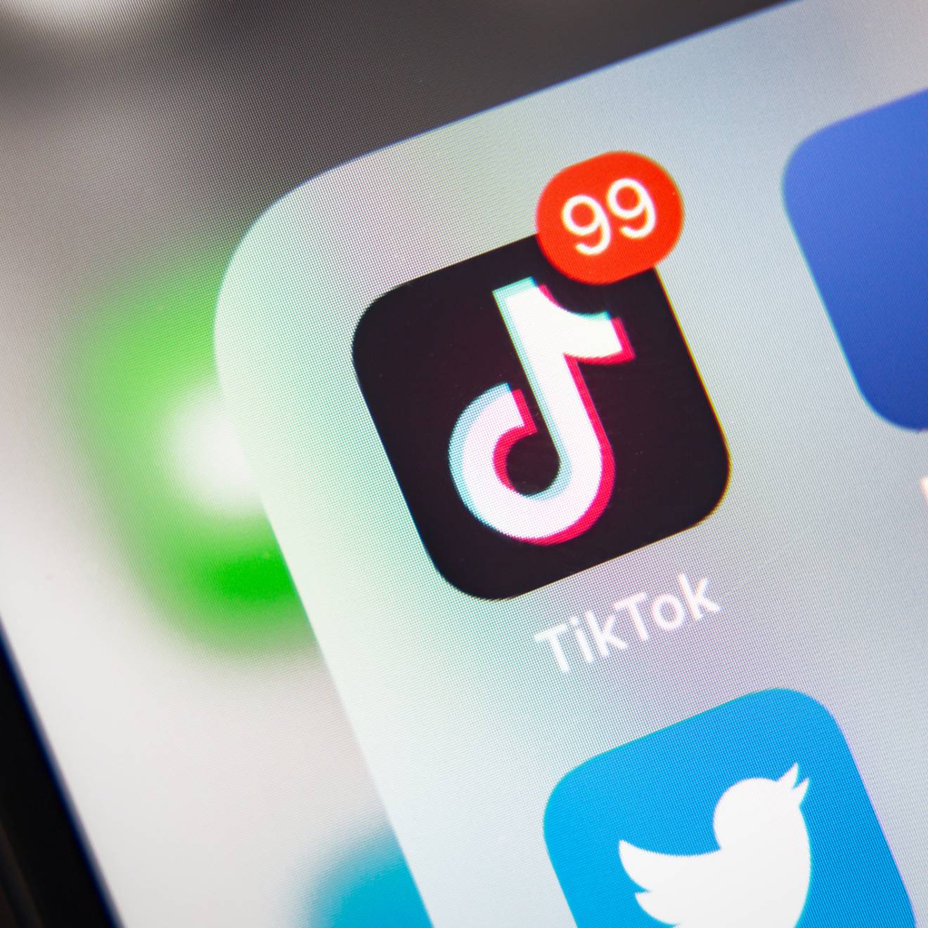 TikTok TikTok and other social media icons on a phone