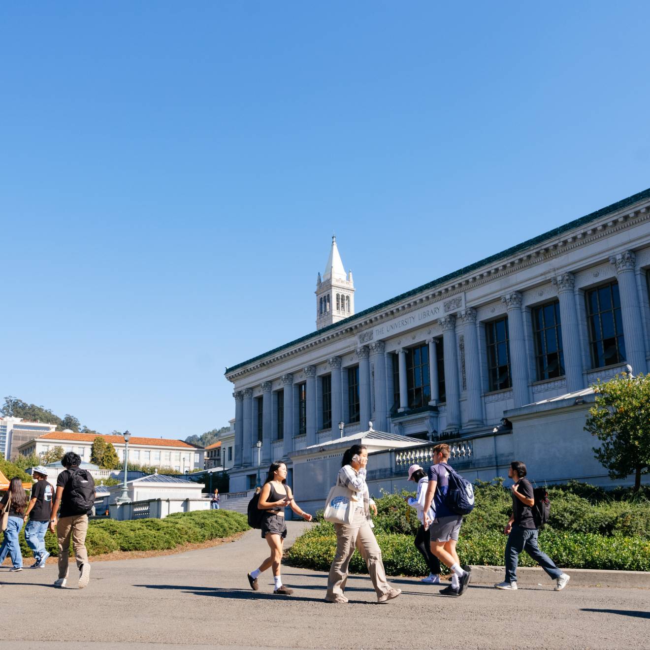 UC Berkeley is the No. 1 public university in the nation Students walk on the UC Berkeley campus, Campanile behind them