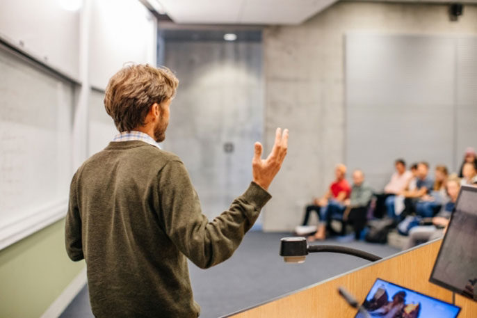 Professor lectures a classroom